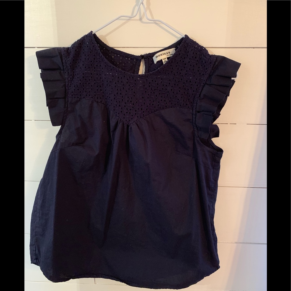 Ruffled and eyelet sleeveless blouse